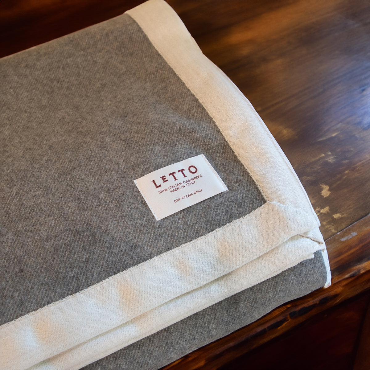 Image of the LETTO Alpina 100% cashmere blanket in color Heather. data-image-id=