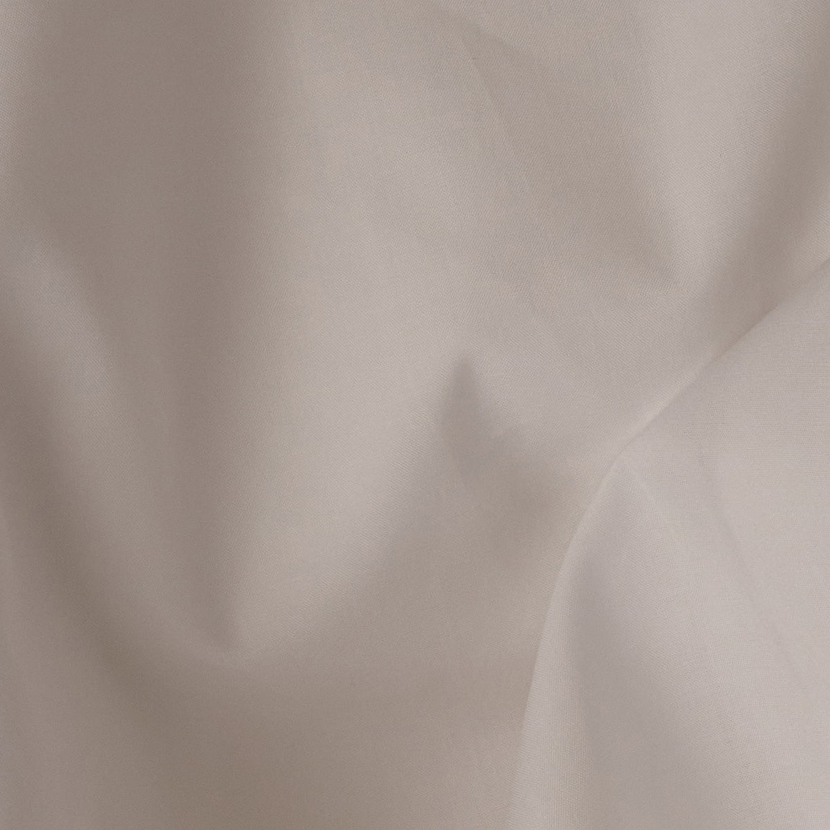 Close-up of LETTO's Woodland Percale Pillowcase pair, featuring light beige percale fabric made from sustainable beech trees, showcasing subtle texture and soft shadows. data-image-id=