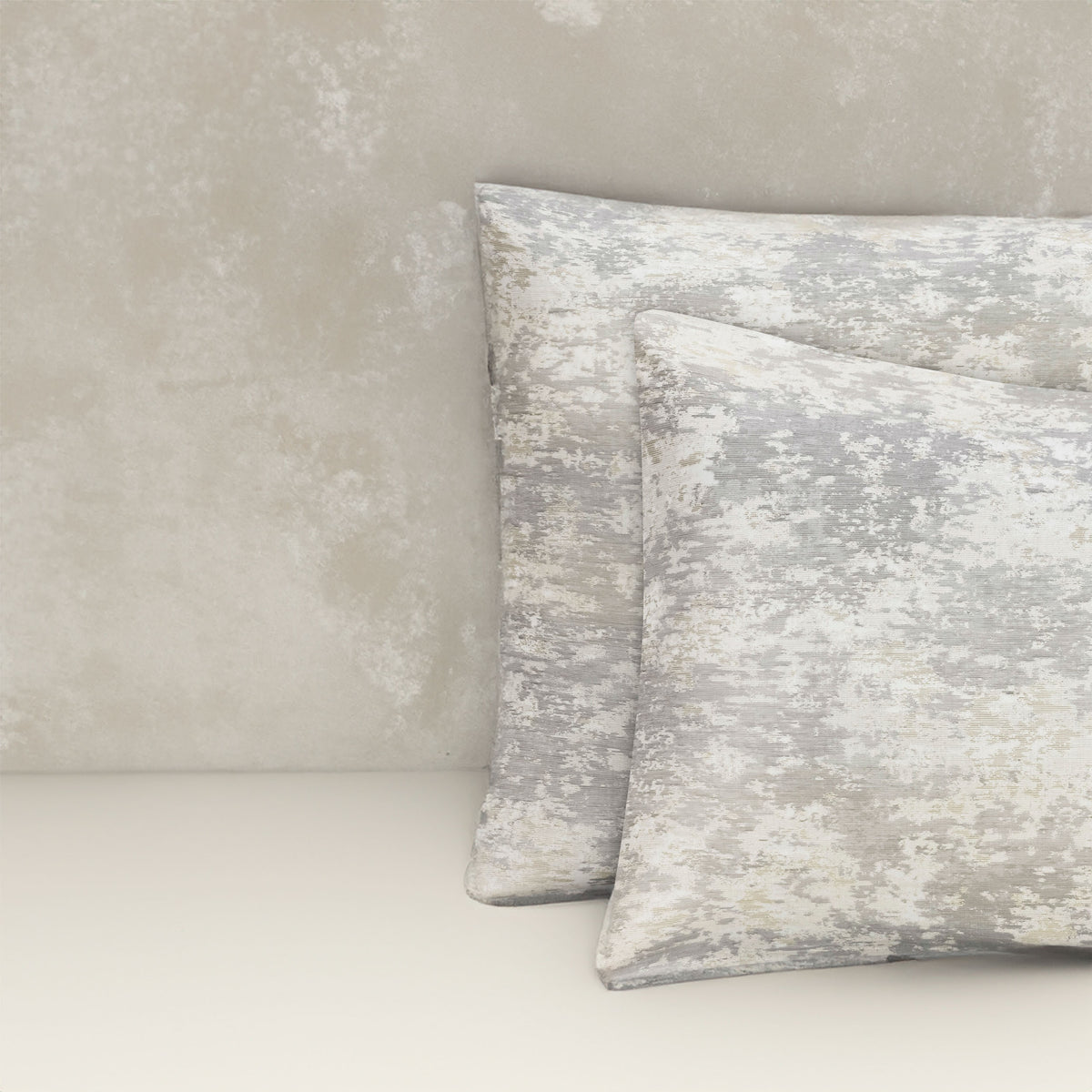 An image of two pillows stacked one in front of the other. The pillow cases are made of LETTO Le Marais Jacquard fabric in color Heather. data-image-id=