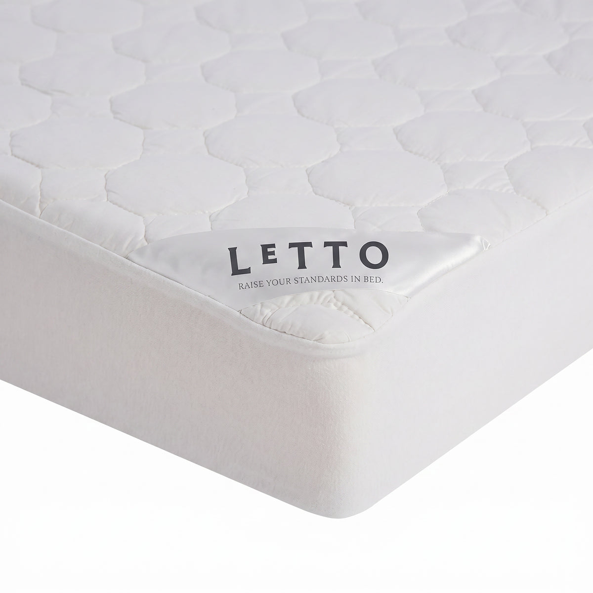 Close-up of a mattress with 'Letto' branding on a white background data-image-id=