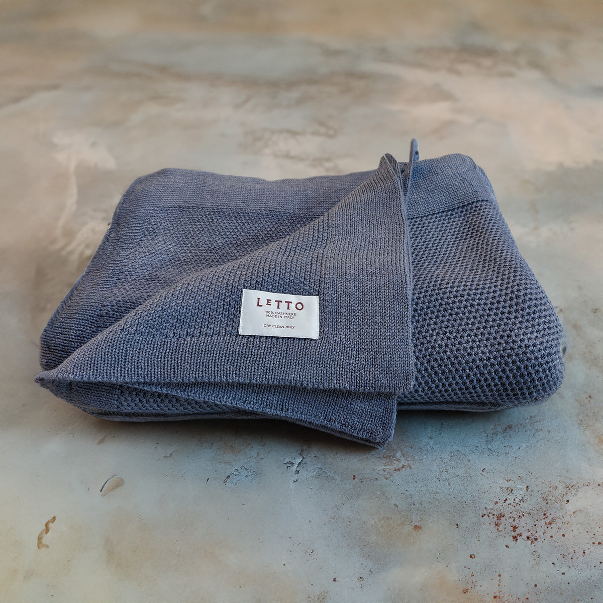Image of the LETTO Domenica Knit Cashmere Throw in color Denim. data-image-id=