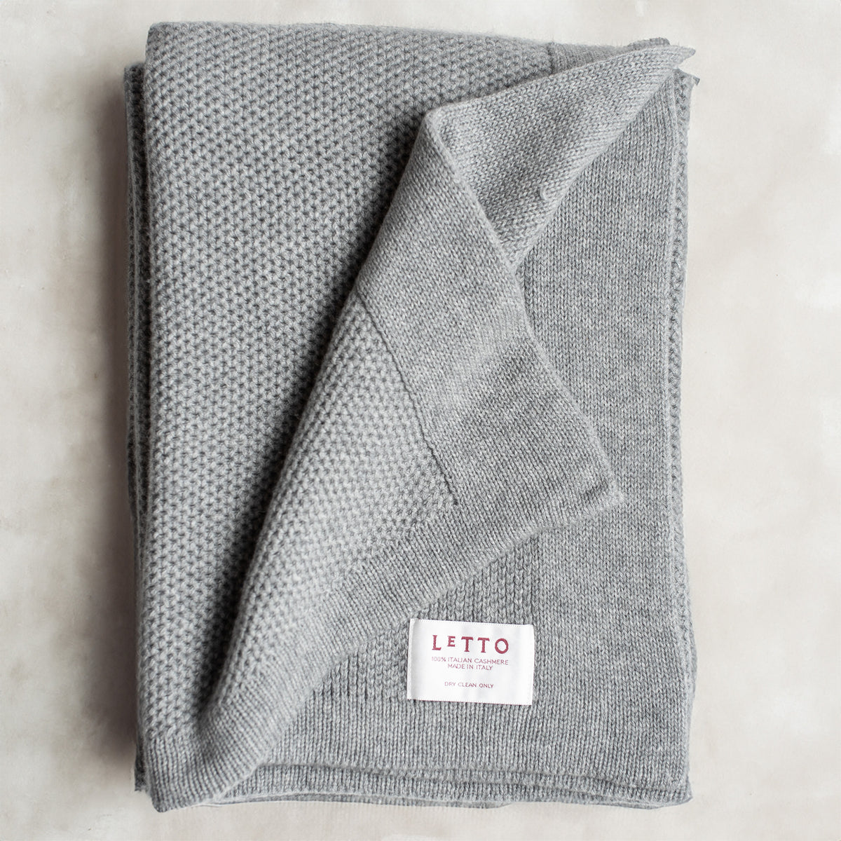 Image of the LETTO Domenica Knit Cashmere Throw in color Gray. data-image-id=