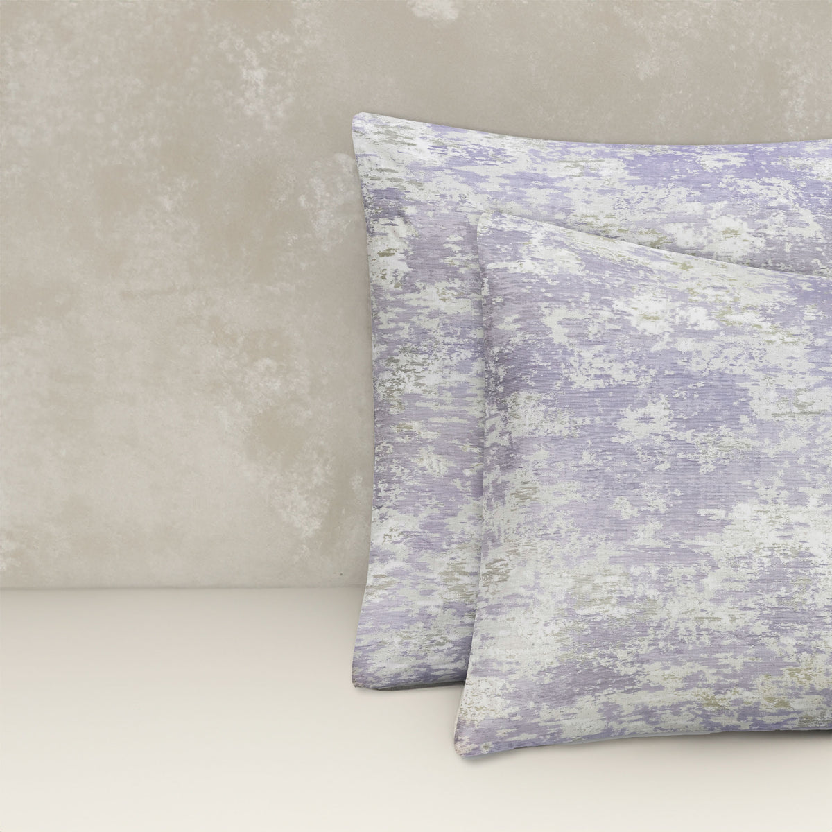 An image of two pillows stacked one in front of the other. The pillow cases are made of LETTO Le Marais Jacquard fabric in color Amethyst. data-image-id=