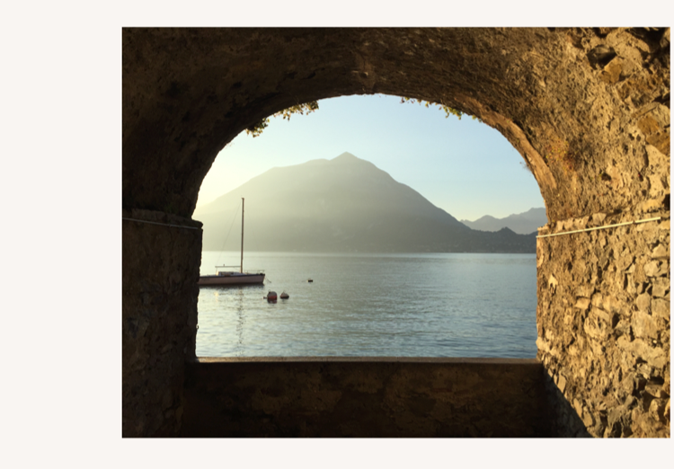 Image of view from inside tunnel viewing out to the ocean in Italy