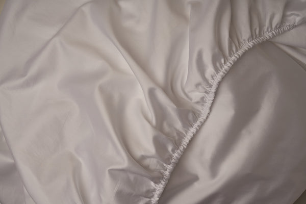 Warm and buttery LETTO Giza Reserve Cotton Sateen fitted sheet in color white, made in Italy.