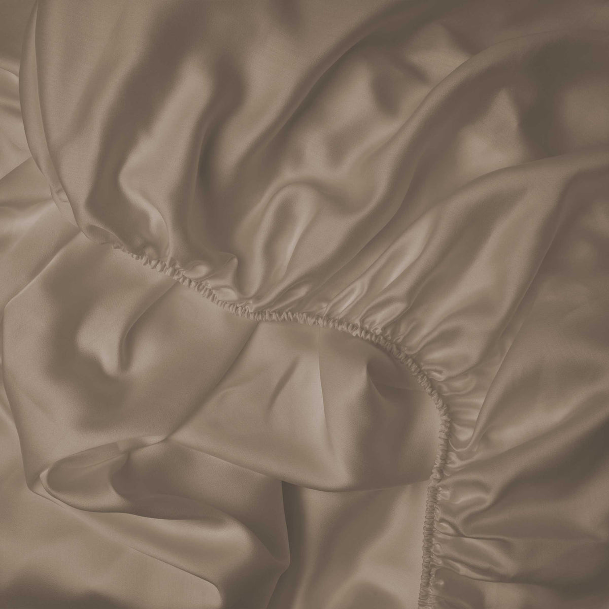 Smooth and silky LETTO Woodland Silk beechwood modal fitted sheet in color candlelight, made in Italy. data-image-id=